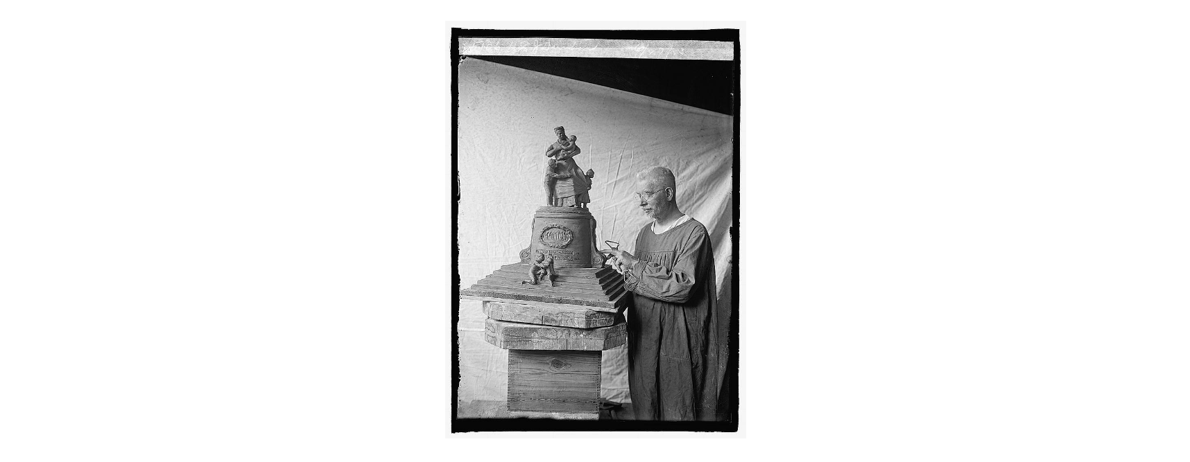Photograph of sculptor U.S.J. Dunbar with his model of the proposed mammy monument. Source: Library of Congress