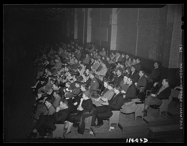 Spectators sitting in rows in Turner's Arena in 1942