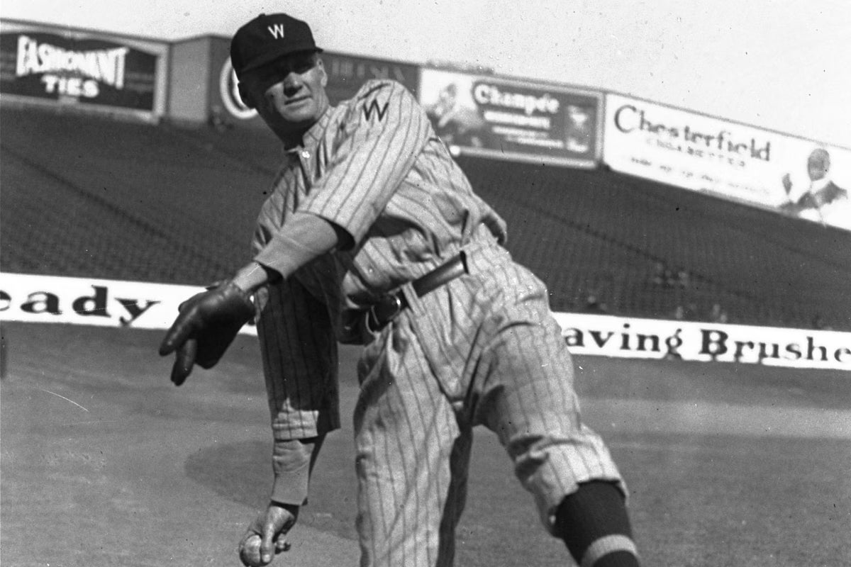 Walter Johnson preparing to throw a baseball in 1924. (Source: AP)