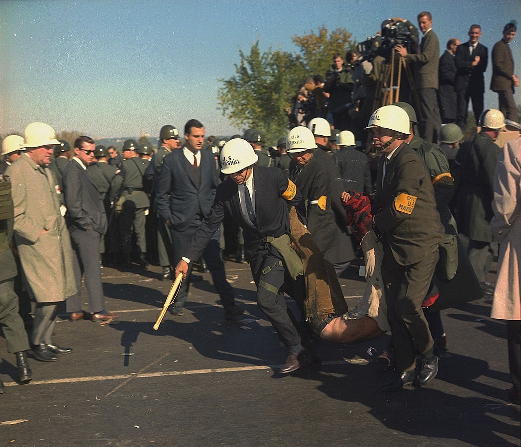 US Marshals drag a protestor away