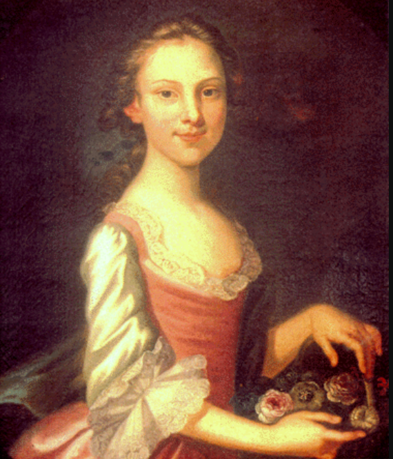Portrait of a young woman in a pink dress with a basket of flowers.