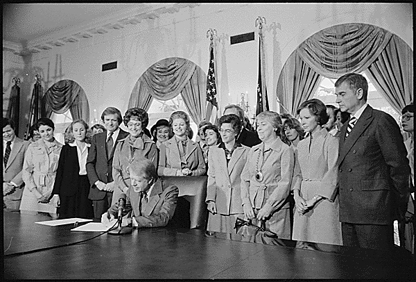 Photograph of Jimmy Carter Signing Extension of Equal Rights Amendment (ERA) Ratification President Jimmy Carter signing the extension resolution of the Equal Rights Amendment in October 1978