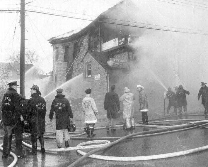 Arlington firefighters battle a blaze on Lee Highway in the 1950s. (Photo source: Chuck Kramaric) Arlington firefighters battle a blaze on Lee Highway in the 1950s. (Photo source: Chuck Kramaric)