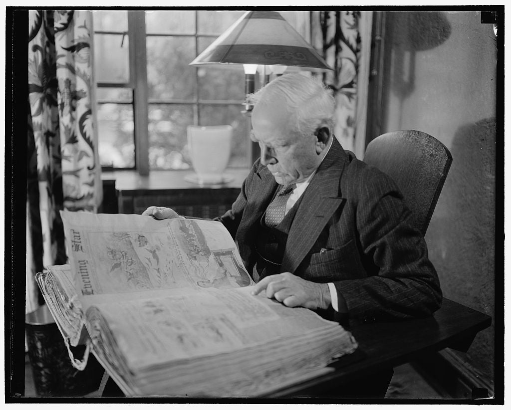 Clark Griffith, owner of the Washington Senators, reading the Evening Star. (Photo Credit: Harris & Ewing, Library of Congress)