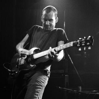 Ian MacKaye of Fugazi performing at the Kilburn National Ballroom in London, 1990. (Photo by Ian Dickson/Redferns)