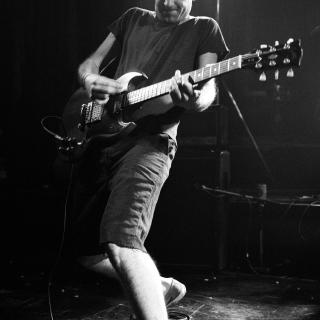 Ian MacKaye of Fugazi performing at the Kilburn National Ballroom in London, 1990. (Photo by Ian Dickson/Redferns)