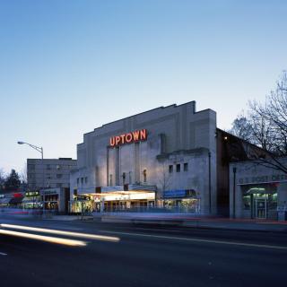 The Uptown Theater at dusk with car headlights. (Source: Carol M. Highsmith Collection, Library of Congress)