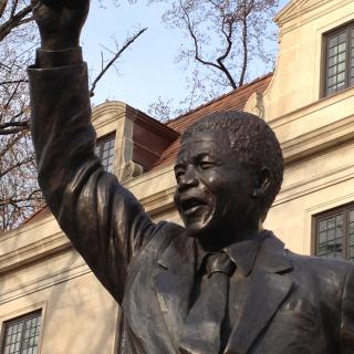 Nelson Mandela statue which stands outside South African Embassy in Washington, DC. (Credit: Flickr user futureatlas.com. Used via Creative Commons Attribution 2.0 Generic license.)