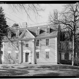 A large colonial house called The Lindens is pictured in a black and white photograph