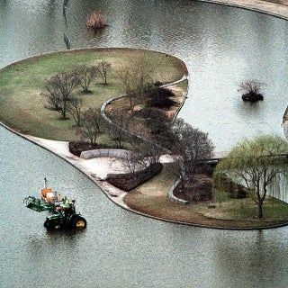Dwight W. Watson staged a one-man protest when he parked his tractor in the pond in Constitution Gardens from March 17-19, 2003.