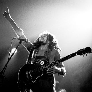 Bob Marley performs live on stage with the Wailers in Voorburg, Netherlands in 1976. (Gijsbert Hanekroot/Redferns via Getty Images)