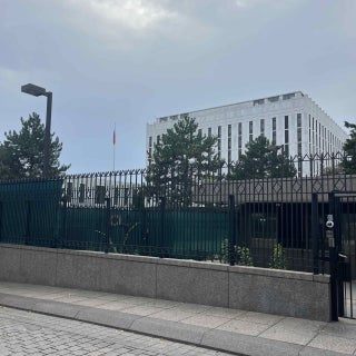 Russian Embassy in Washington DC with security fence visible.