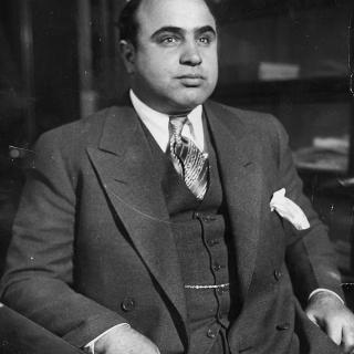 Al Capone in 1930 as photographed by the FBI's Chicago Bureau (Source: Wikipedia)