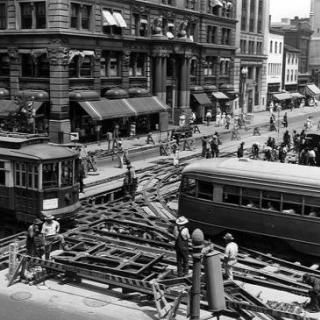 Workers repair streetcar tracks at 14th and G Streets NW in 1941. Source: Library of Congress