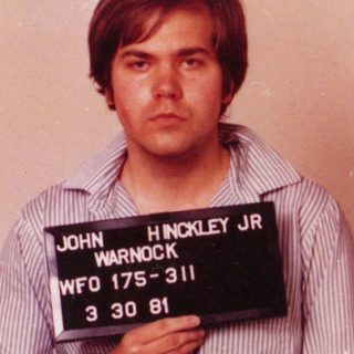 Would-be Presidential Assassin John Hinckley, Jr., in a mugshot taken after his arrest. (Photo credit: FBI)