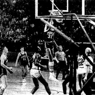 Lew Alcindor throws down a slam dunk in the 1965 game between Power Memorial Academy and DeMatha Catholic at Cole Field House. Dematha won the game and ended Power Memorial's 71 game winning streak. (Photo source: The Washington Star)