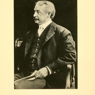 A portrait photograph of Francis Davis Millet