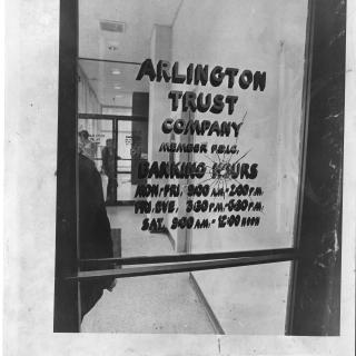 Bullet hole in the door of Arlington Trust Company bank in Crystal City, where the Tuller's crime spree began in 1972. (Reprinted with permission of DC Public Library, Star Collection © Washington Post)