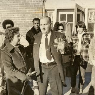 Lt. O.W. Larsen talks with his wife shortly after his release. (Photo Credit: Ken Heinen, Reprinted with permission of the DC Public Library, Star Collection, © Washington Post.)