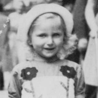 Portrait of Josiane Aizenberg walking down the streets of Brussels, circa 1941