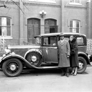 A husband and wife stand outside the Metropolitan Church (Source: Scurlock Collection/The Smithsonian)