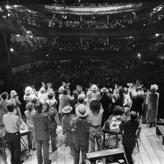 The cast of Inherit the Wind and the audience giving each other a standing ovation in Moscow (Source: Arena Stage)