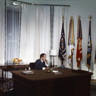 “President Nixon in the Oval Office speaking on the telephone to the Apollo XI astronauts Neil Armstrong and Edwin “Buzz” Aldrin while they were on the Moon, July 20, 1969.” (Photo Source: Richard Nixon Presidential Library and Museum Website (National Archives) https://www.archives.gov/presidential-libraries/events/centennials/nixon/exhibit/nixon-online-exhibit-calls.html