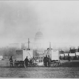 Gas generators on the National Mall with the Capitol Building in the background.