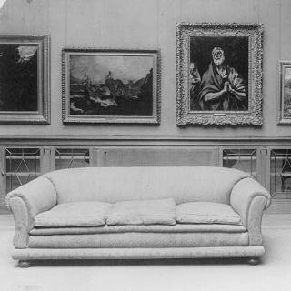 A gallery with paintings and a sofa at the Phillips Collection, DC