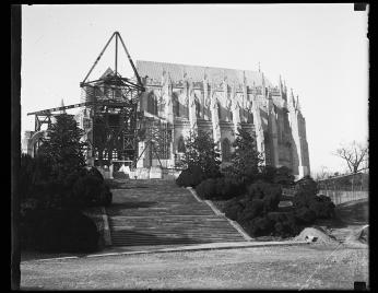 A black-and-white photo of the National Cathedral under construction in 1932