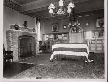 Smithson's body lying in the South Tower of the castle: his coffin is in the center of the room, draped in the American flag