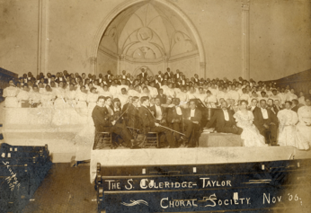 The Samuel Coleridge-Taylor Choral Society, a chorus of about 200 members, posing with orchestra and conductor Samuel Coleridge-Taylor in 1906.