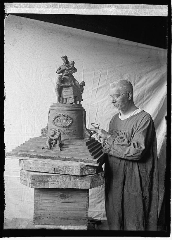 Photograph of sculptor U.S.J. Dunbar with his model of the proposed mammy monument. Source: Library of Congress