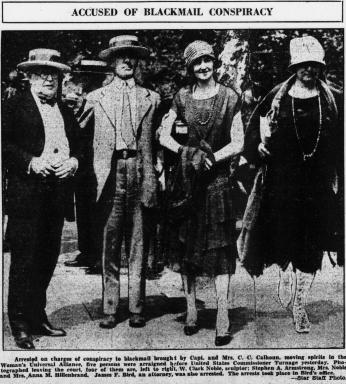A newspaper photograph of four of the five defendants