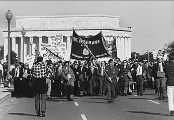 Veterans of the Abe Lincoln brigade march across the Memorial Bridge