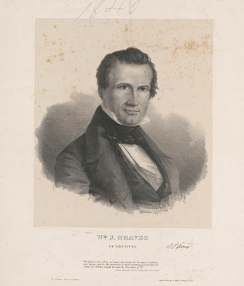 Portrait of William J. Graves. He is wearing a white shirt, black tie, and black coat.