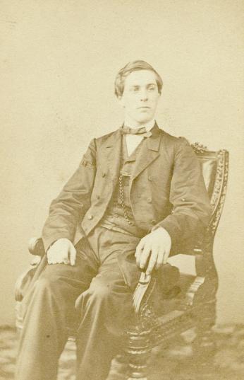 David Homer Bates sitting in chair, 1865. (Source: Library of Congress)