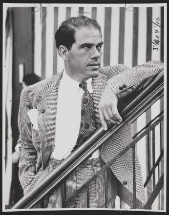 Frank Capra dressed in coat and tie looking from left to right in 1937. (Source: Library of Congress)