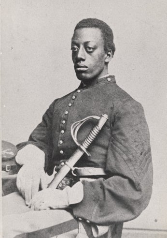 Young African American man in Civil War era military uniform.