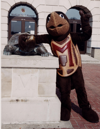Testudo mascot standing with Testudo statue, McKeldin Library, University of Maryland, circa 2003