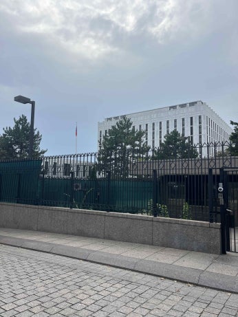 Russian Embassy in Washington DC with security fence visible.
