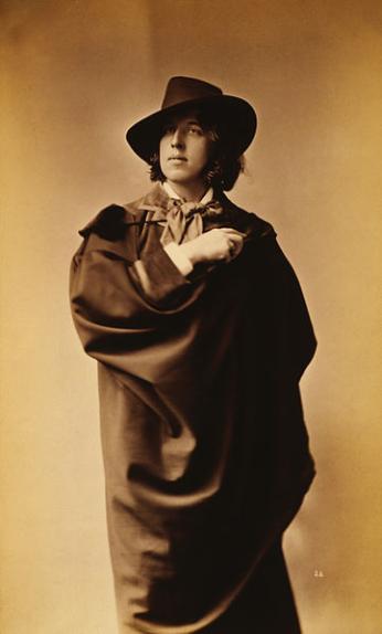 This man knows how to rock a cape. (1882 photograph of Oscar Wilde by Napoleon Sarony. Source: Wikipedia Commons)