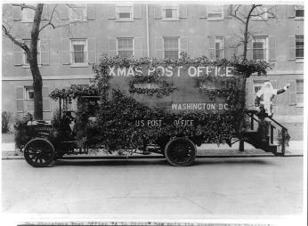 Postal truck in Washington decorated in an appeal for early mailing for the Christmas season, 1921. (Source: Library of Congress)