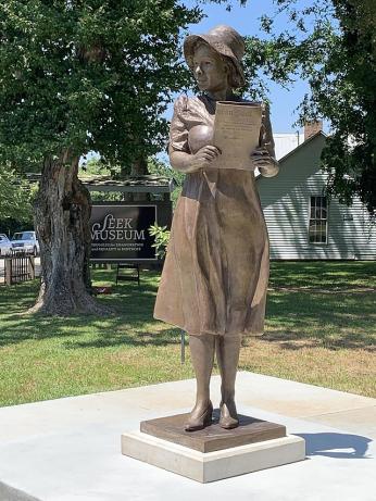 A bronze statue of Alice Dunnigan sits in a park in her hometown of Russellville, Kentucky, memorializing the groundbreaking journalist.