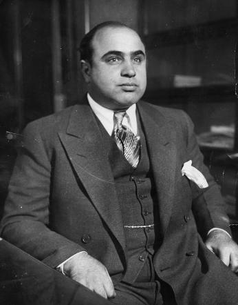 Al Capone in 1930 as photographed by the FBI's Chicago Bureau (Source: Wikipedia)