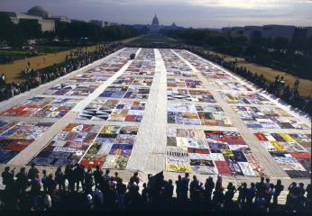 View of the AIDS Memorial Quilt on the National Mall on October 11, 1987. (Photo courtesy of the NAMES Project.) View of the AIDS Memorial Quilt on the National Mall on October 11, 1987. (Photo courtesy of the NAMES Project.)