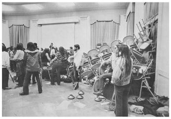 A barricade of chairs seals the protesters inside the building