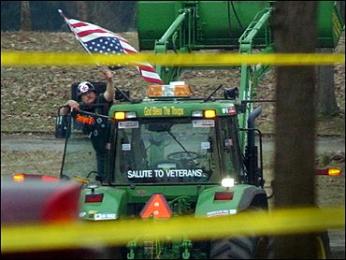 North Carolina tobacco farmer Dwight Watson single-handedly gridlocked downtown Washington in March 2003 when he drove his tractor into the pond at Constitution Gardens and claimed to have a bomb. (Photo source: Associated Press via Wikipedia)
