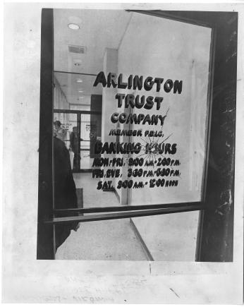 Bullet hole in the door of Arlington Trust Company bank in Crystal City, where the Tuller's crime spree began in 1972. (Reprinted with permission of DC Public Library, Star Collection © Washington Post)
