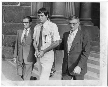 Jonathan Tuller is taken from the FBI field office in Washington after his 1975 surrender. (Reprinted with permission of DC Public Library, Star Collection © Washington Post)